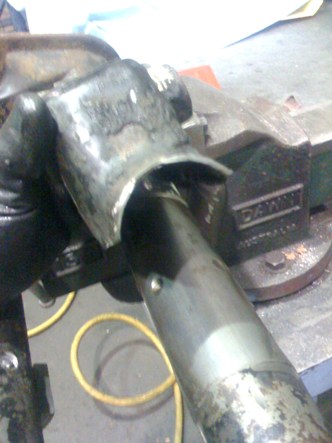 removing the steering knuckle mount to access the lock dimples