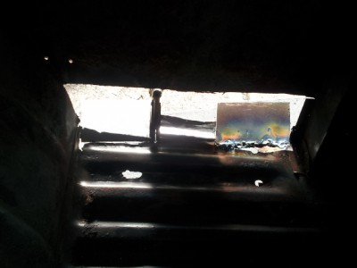 Viewed from the inside.  The rust was cut out of the floor pan just above the Short sill and new steel welded in place before tapping into shape.