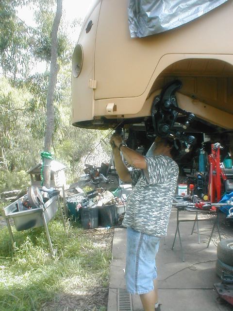 The old brake cylinder bracket is removed to adapt to a brake booster.